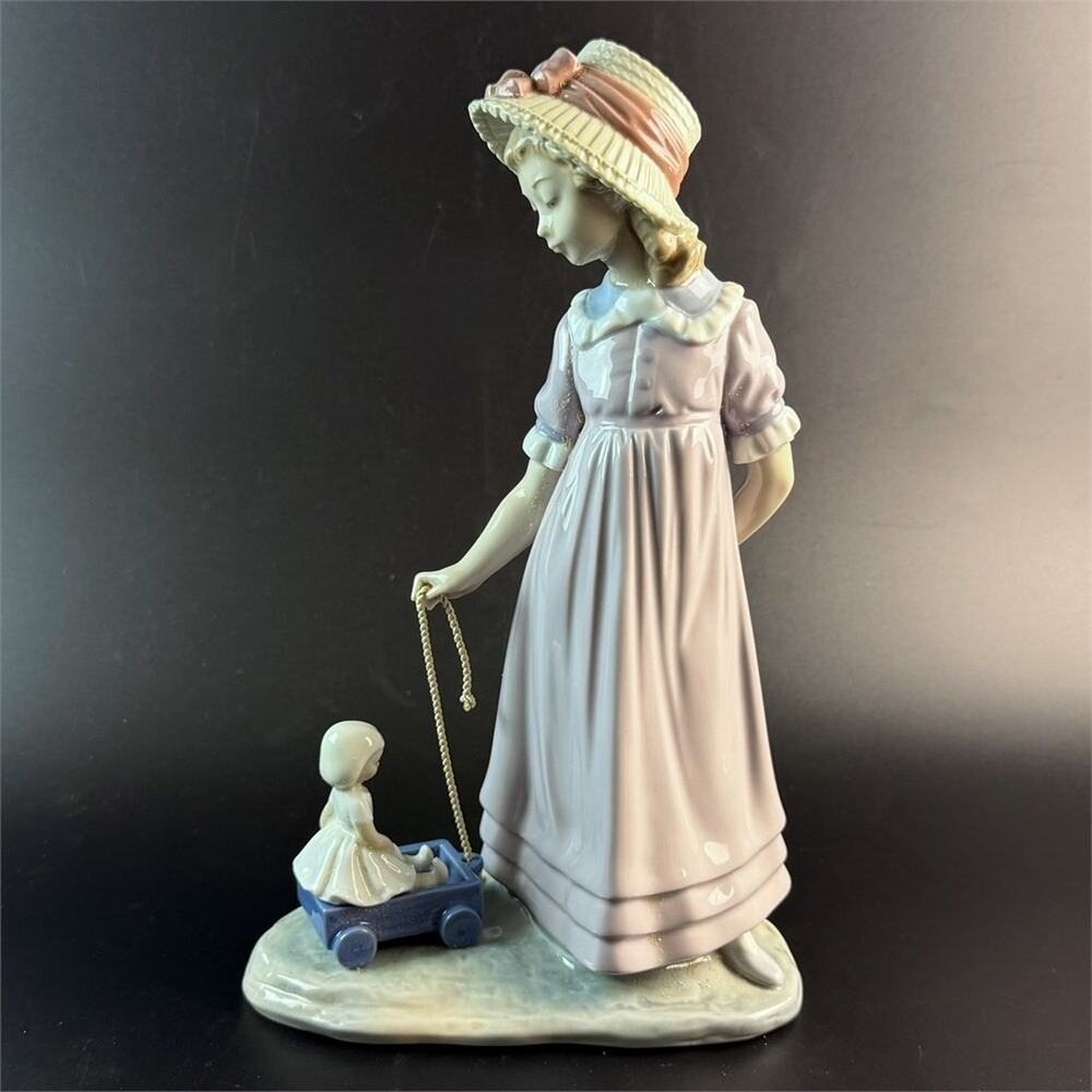 Lladro Girl with Toy Wagon Porcelain Sculpture